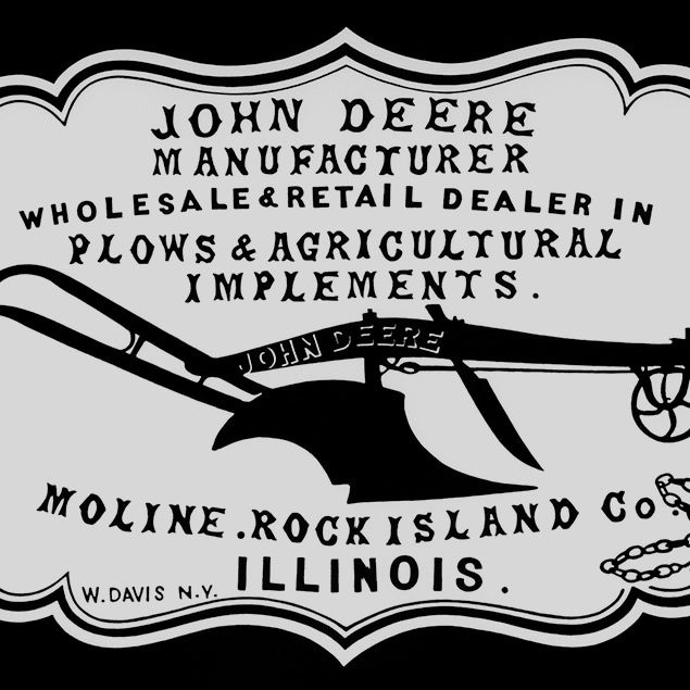 O reclamă emblematică a distribuitorului din 1855, "John Deere Producător, distribuitor cu ridicata şi cu amănuntul de pluguri şi instrumente agricole. Moline, Rock Island Co. Illinois"