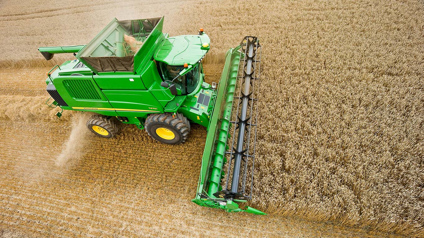 Alimentare lină prin degetele escamotabile poziţionate pe întreaga lăţime a melcului