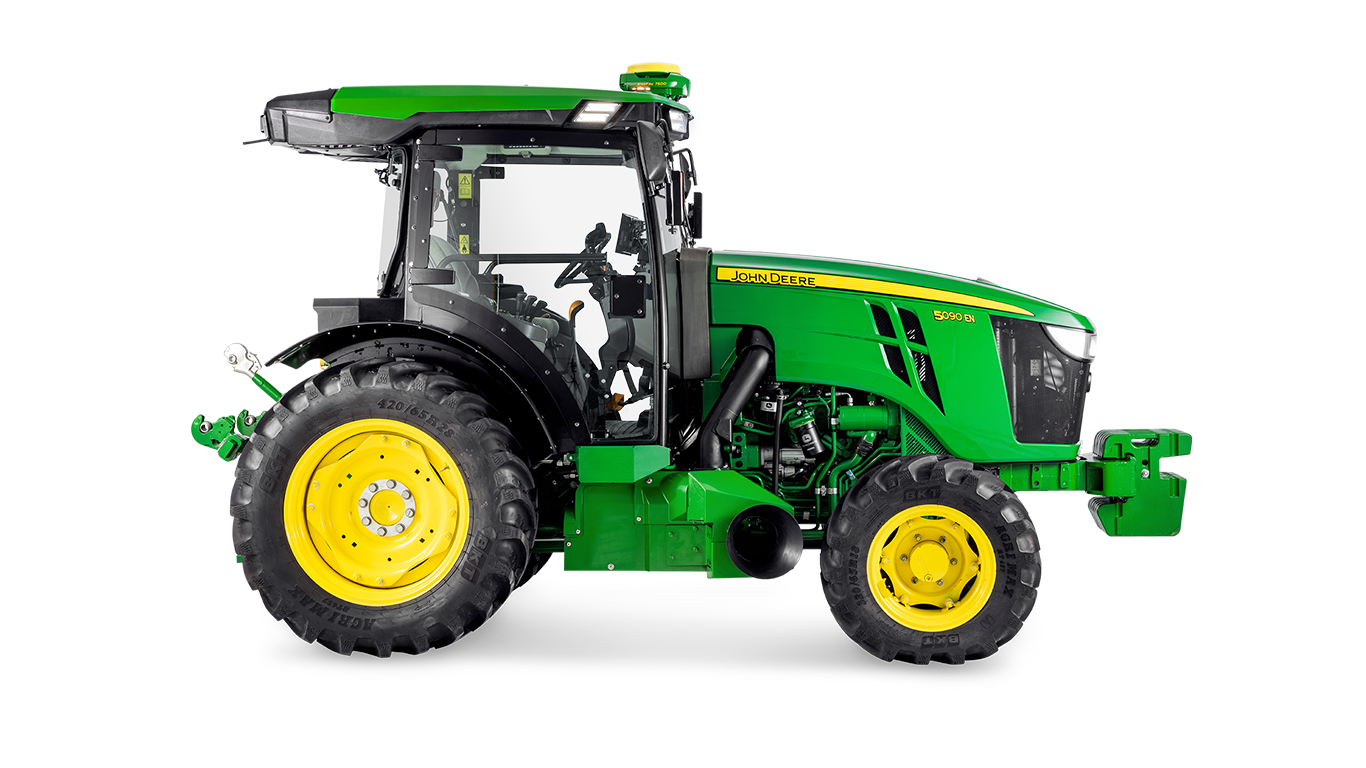 Profilul lateral al tractorului John Deere 5090EN, care evidenţiază designul cabinei şi pneurile din spate mari.